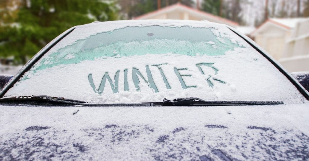 Image of the word winter written in snow on a car windscreen