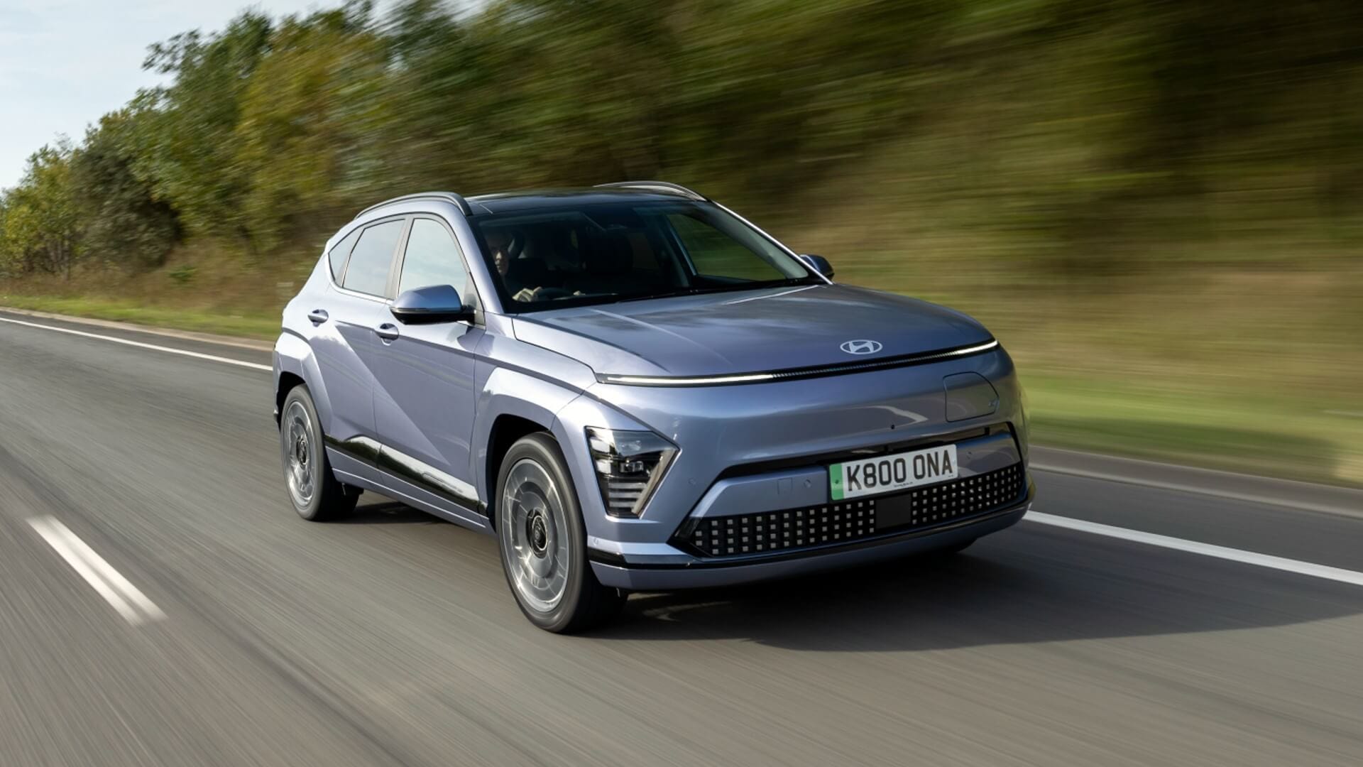 Hyundai Kona electric car driving on road