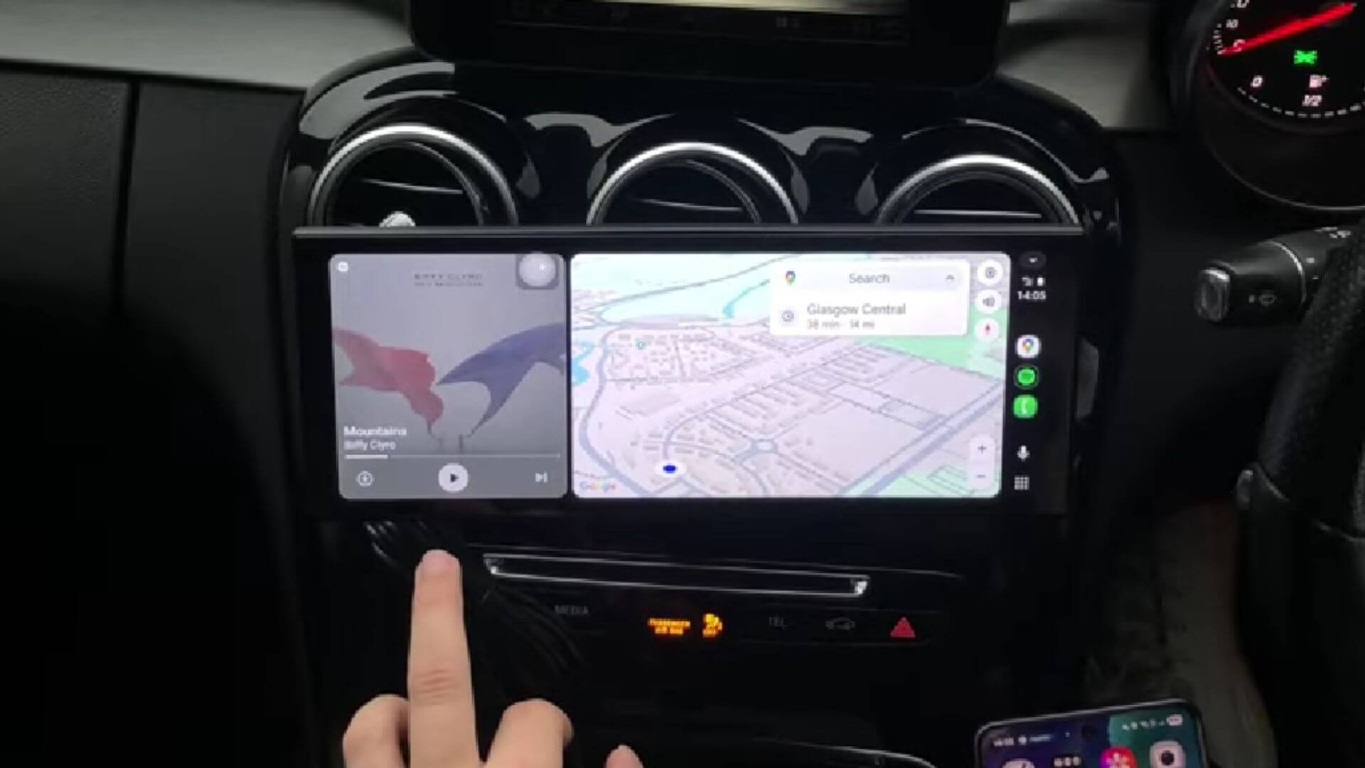Dylan testing the CarPlay screen in his car.
