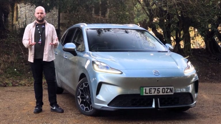 Motoring Journalist Dylan Freeburn standing with the 2026 MG4 Urban for review.